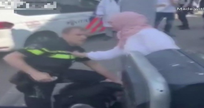 Ülke şokta: Polis kadını hem tekmeledi, hem de yumrukladı!