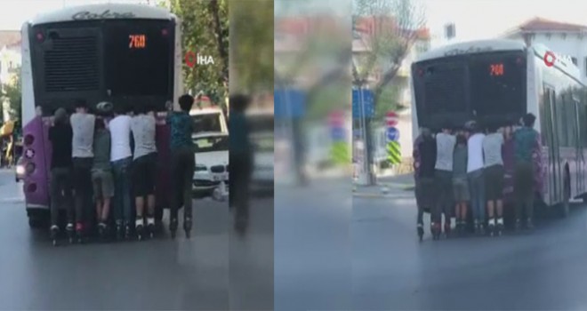 Patenci gençlerin otobüsün arkasına takılarak yaptıkları tehlikeli yolculuk