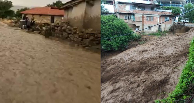 Şiddetli yağış köydeki yolları dereye çevirdi