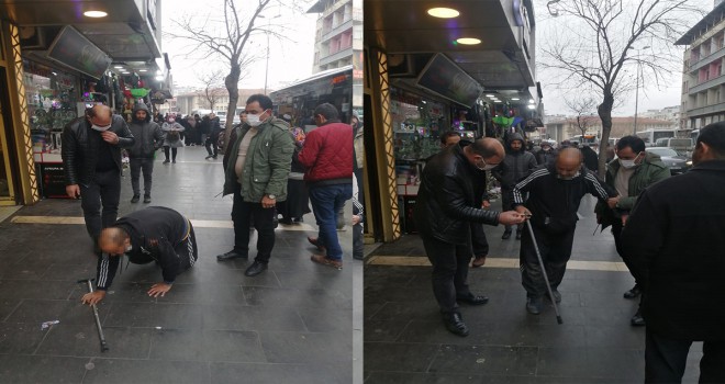 Sürünme numarasıyla dilenen şahıs zabıtadan kaçamadı