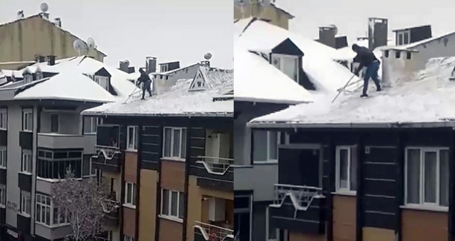 Çatıda tehlikeli kar temizleme anı kamerada
