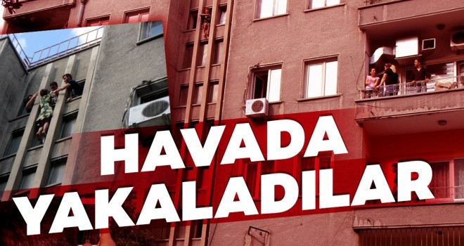  8. katın penceresinde intihar girişiminde bulunan kadını havada yakaladılar