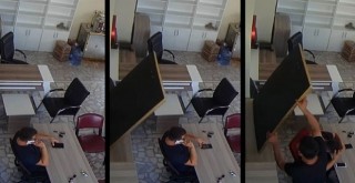 İşyerinde otururken kafasına tablo düştü